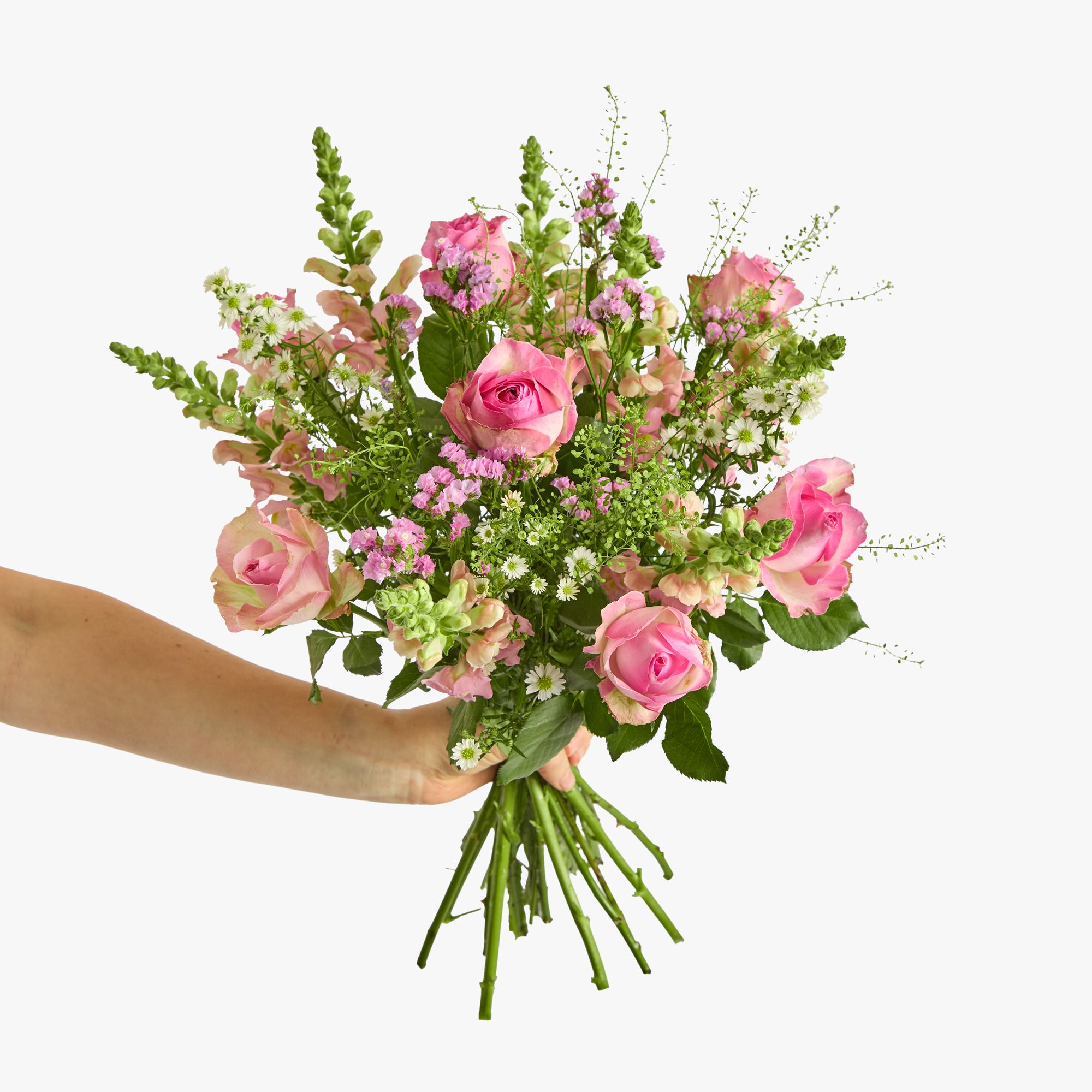 Roses, statice and antirrhinum, white asters and greenbell