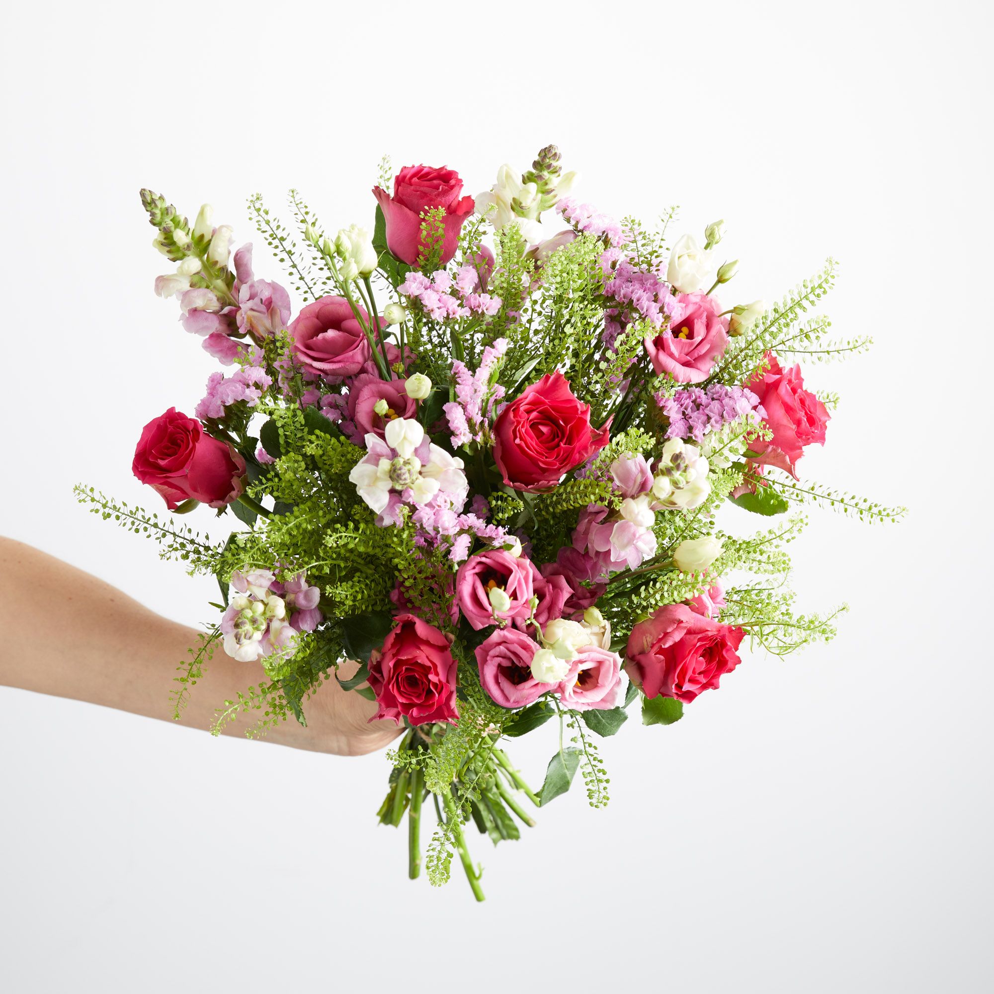 Roses, lisianthus, antirrhinum, limonium, robusta and pistache