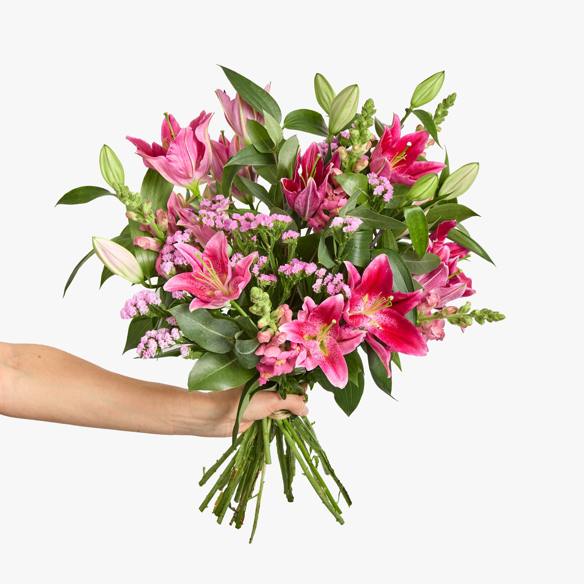 Lilies, statice, antirrhinum and eucalyptus robusta